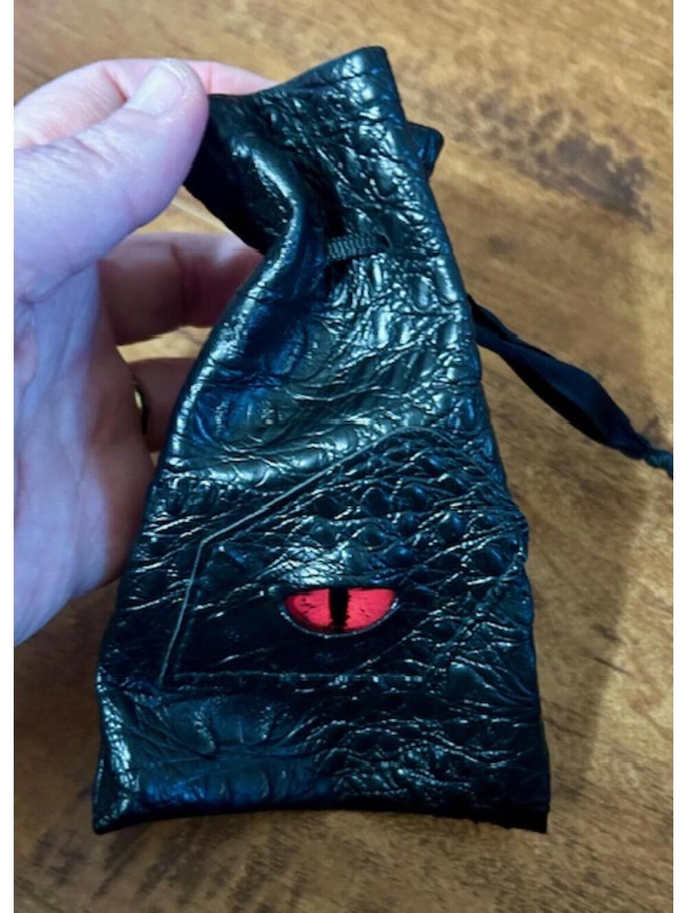 Dragon Red Eye Dice Bag Black Textured Drawstring Pouch with Red Eye Detail